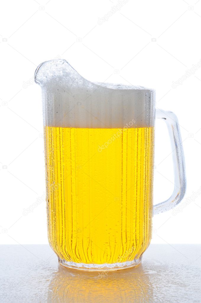 Pitcher of Beer on Wet Counter Top