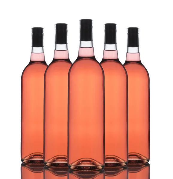 Skupina blush wine lahví — Stock fotografie