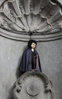 Manneken Pis in Brussels dressed as Dracula clipart