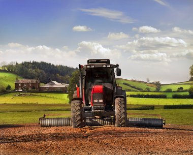 Tractor working the land