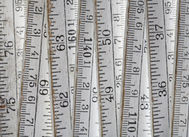 Old folding carpenter's ruler clipart