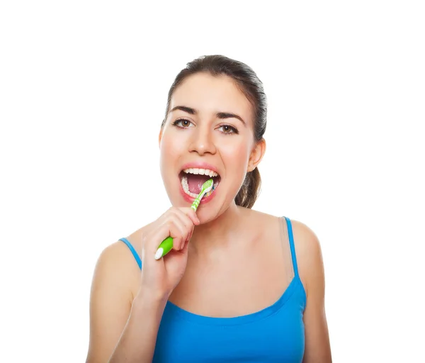 Niedliche und glückliche Frau beim Zähneputzen — Stockfoto
