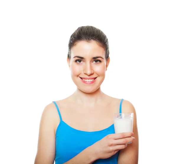 Portrait of a beautiful young adult holding glass of milk — Stock Photo, Image