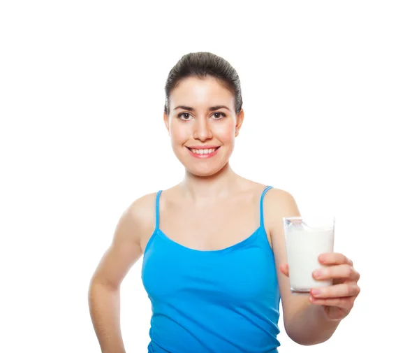 Portrait of a beautiful young adult holding glass of milk Stock Picture