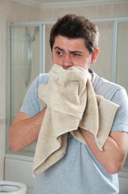 Man looking himself in front of mirror clipart