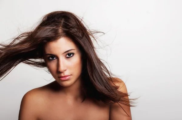 stock image Portrait of a beautiful young woman looking into the camera