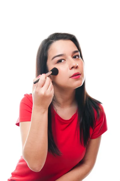 Beautiful young female applying her make up — Stock Photo, Image