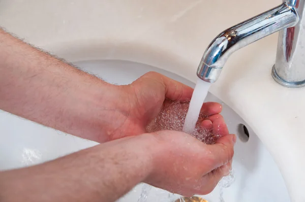 Stock image View of a male washing hands