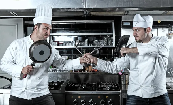 Két szakácsok harci portréja Jogdíjmentes Stock Fotók