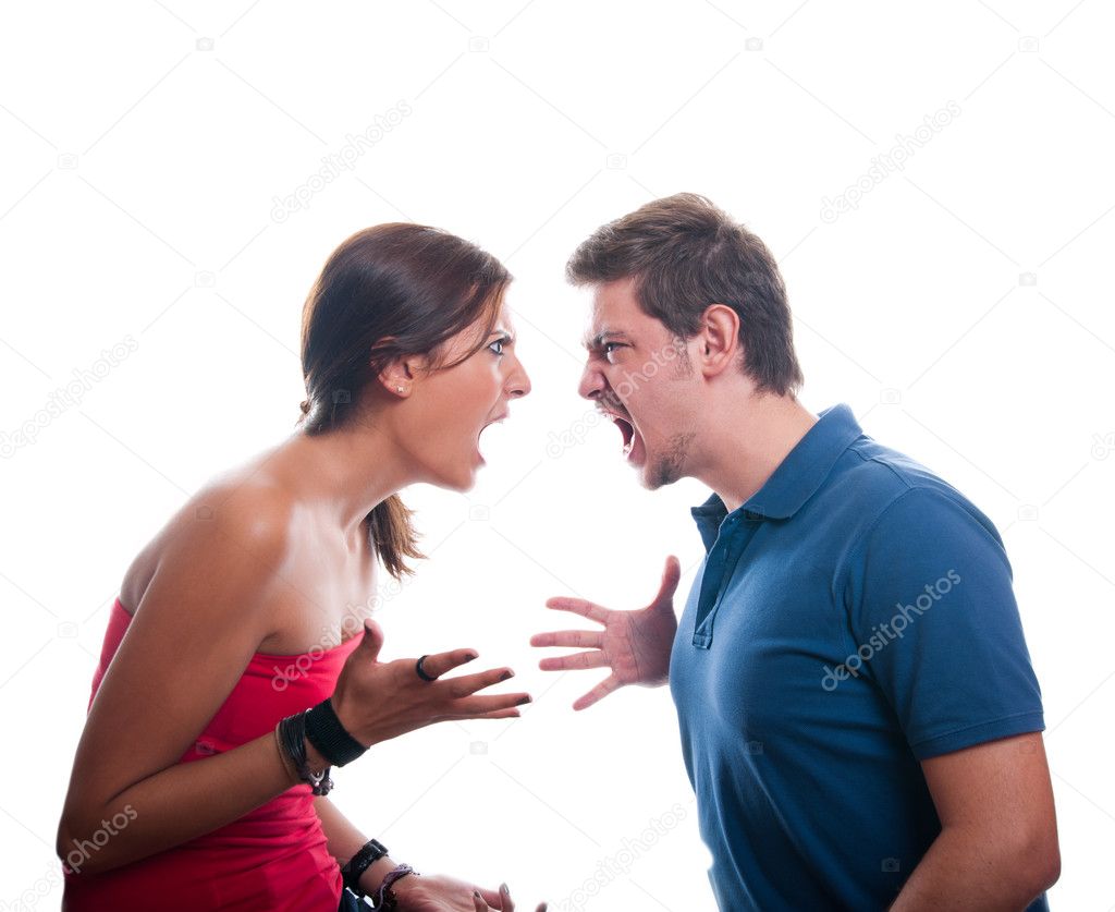 Studio shot of a young couple fighting