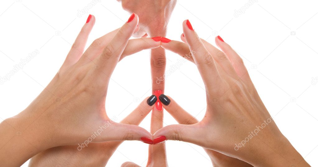 Studio shot of a peace sign formed by using hands