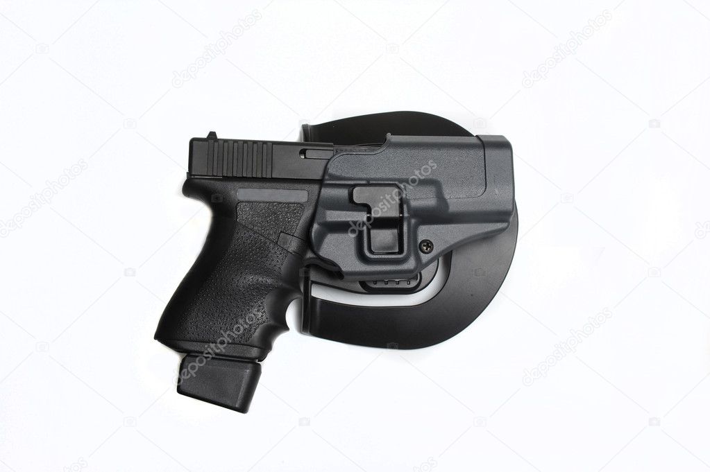 9mm pistol holstered