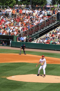 GREENVILLE, SC - MAY 26: Major league baseball player John Smoltz pitching on rehab assignment for the Greenville Drive May 26, 2009 in Greenville ,SC clipart