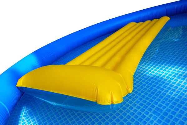 Inflatable mattress in pool — Stock Photo, Image