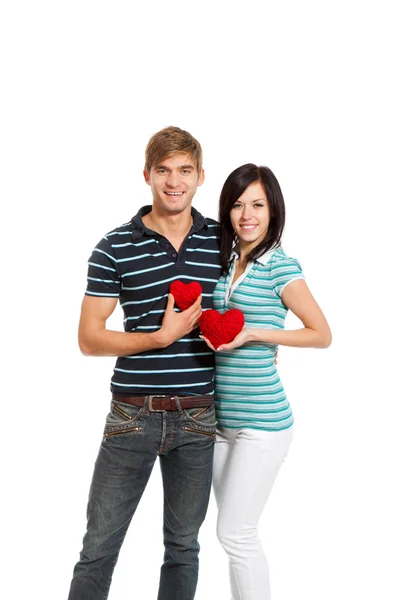 年轻的爱夫妇握着红色的心 — 图库照片
