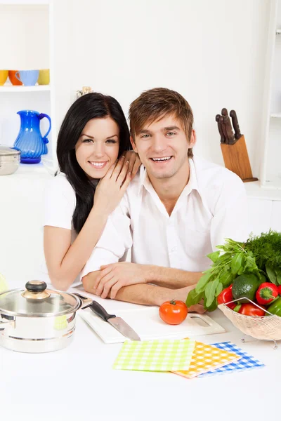 Young couple in kitchen Stock Image
