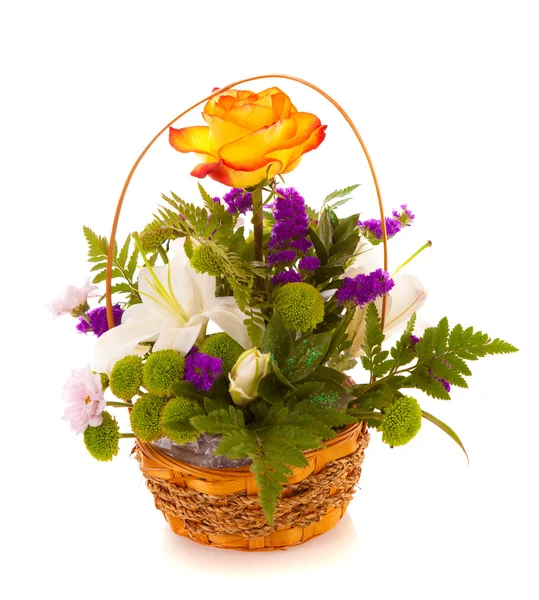 Bouquet flowers in a basket, isolated. — Stock Photo, Image