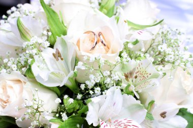 Wedding bouquet about wedding rings