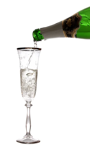 Egy üveg pezsgő ered. — Stock Fotó