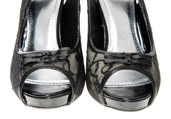 Naisten kengät, valkoisella pohjalla . — kuvapankkivalokuva