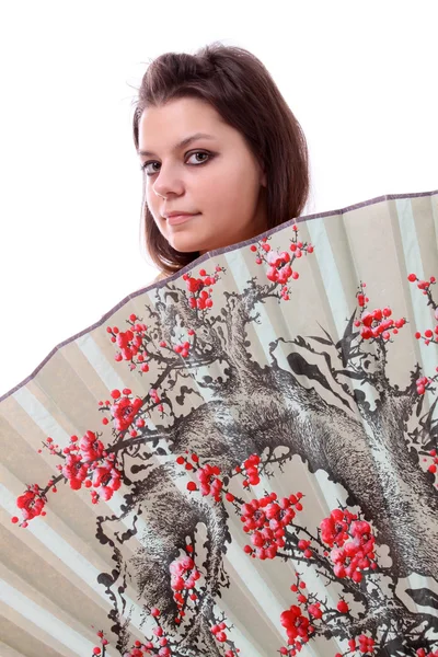 Teenager with a Japanese fan,isolated. — Stock Photo, Image