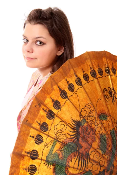 Girl teenager with the Chinese umbrella, isolated. — Stock Photo, Image