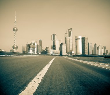 The abstract background of the road and city . clipart