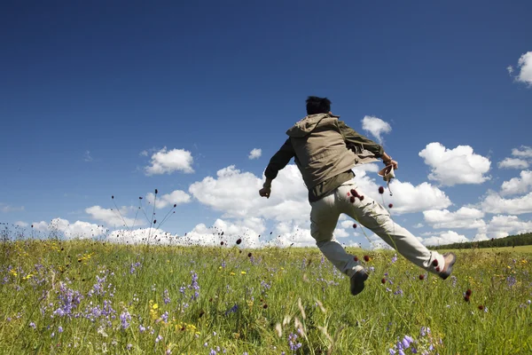 The man in the meadow outdoor — Stock Photo, Image
