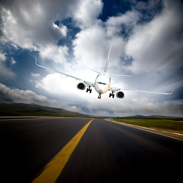 The airplane with the blue sky background. — Stock Photo, Image