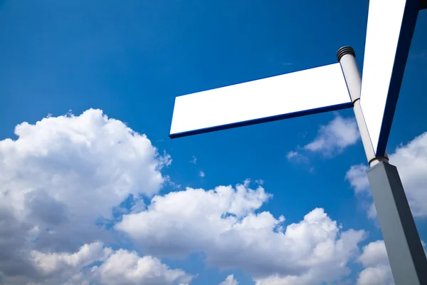 stock image The road sign with the blue sky background.