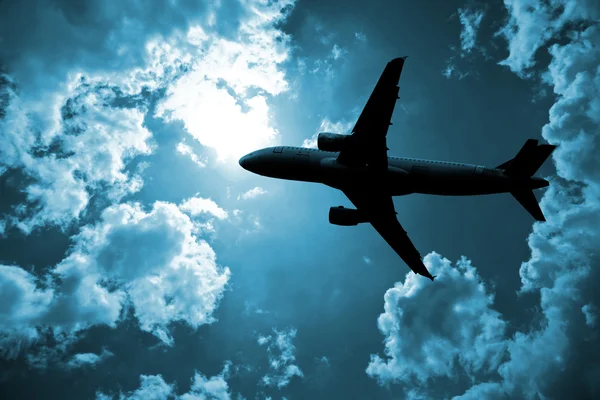 Airplane and cloud — Stock Photo, Image
