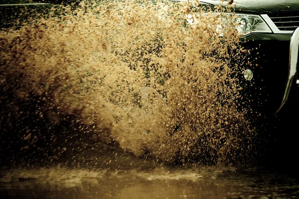 Suv splash on the river outdoor ,traveling on the road. — Stock Photo, Image