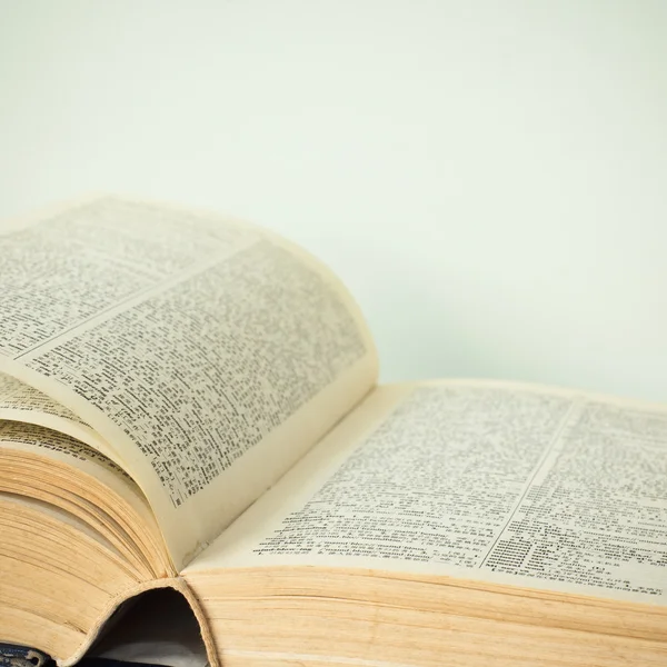 stock image A large stack of old book in home .