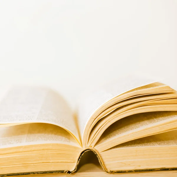 stock image A large stack of old book in home .