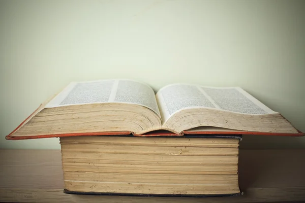 stock image A large stack of old book in home .