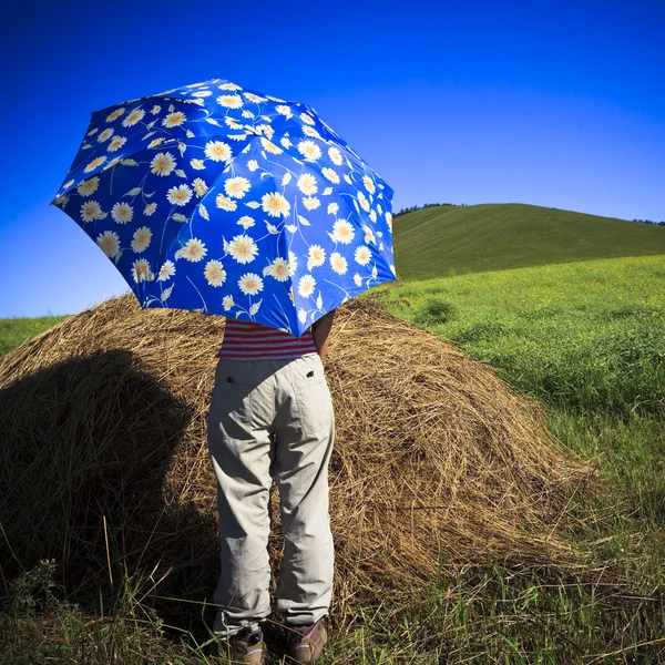 stock image The girl stand in the wheaten field.