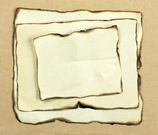 Oude verbrand papier met verbrande randen — Stockfoto
