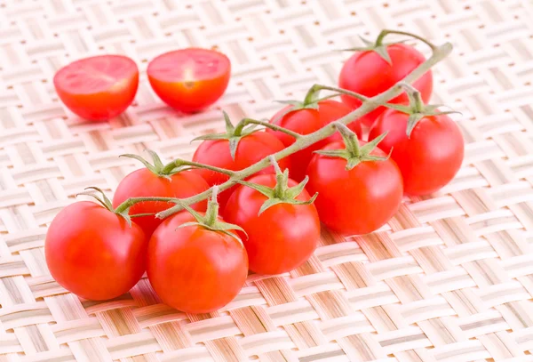 Tomatoes on a mat — Stock Photo, Image