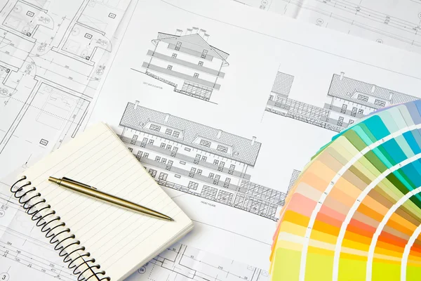 Architectural drawing and notepad — Stock Photo, Image