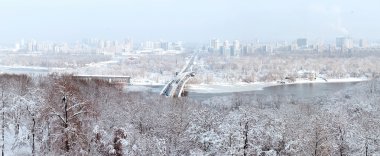 Winter panorama of Kiev and the Dnieper River clipart
