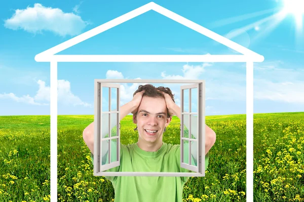 Teenager.The house on a meadow — Stock Photo, Image