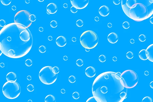 Tvål bubblor på en blå bakgrund — Stockfoto