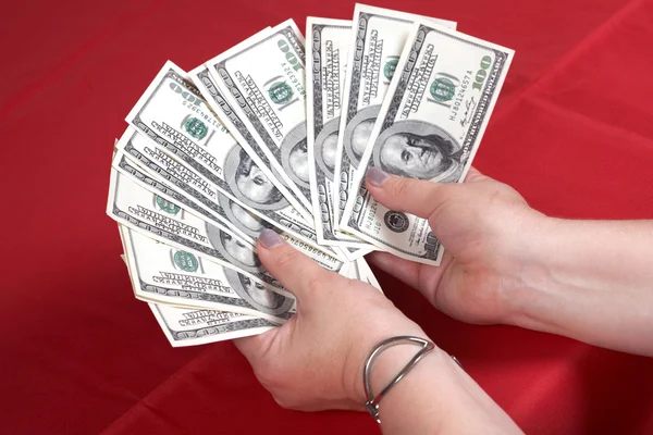 Dollars and hands — Stock Photo, Image