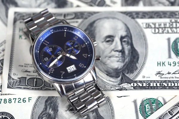 Horloge et argent Photo De Stock