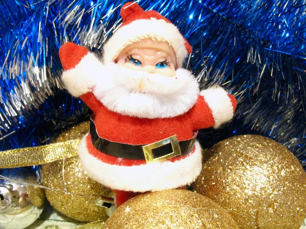 Složení Vánoce s santa a zlaté cibule — Stock fotografie