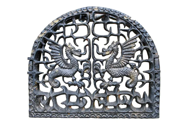 Fireplace door with metallic dragon symbol isolated — Stock Photo, Image