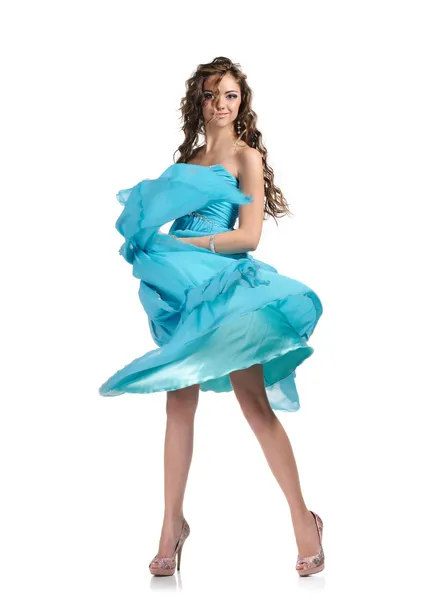 Foto van mooi meisje in de hemelsblauwe jurk geïsoleerd op wit — Stockfoto