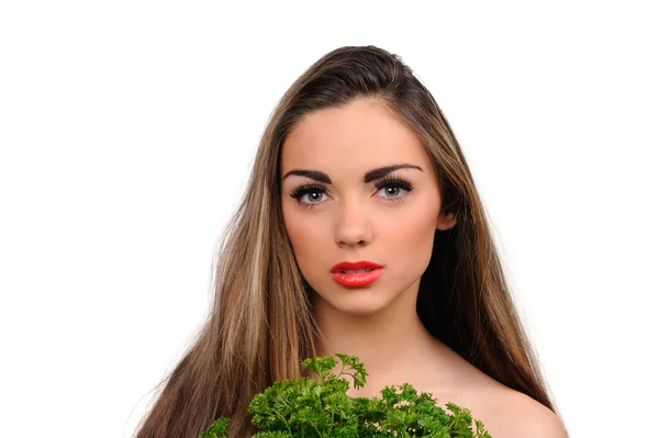 Portrait of beautiful girl with green parsley — Stock Photo, Image