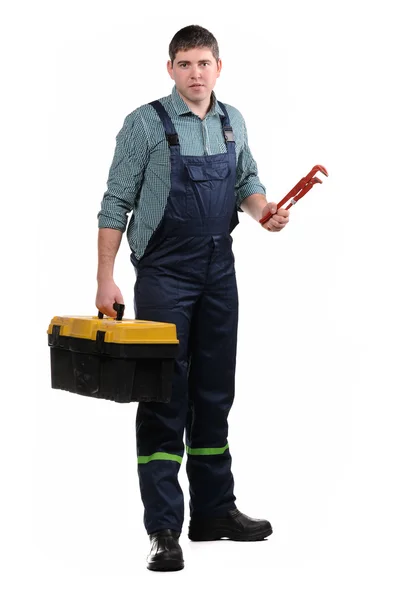 Mechaniker mit Werkzeugen auf weißem Hintergrund — Stockfoto
