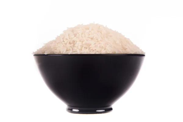 Рис в черной миске — стоковое фото